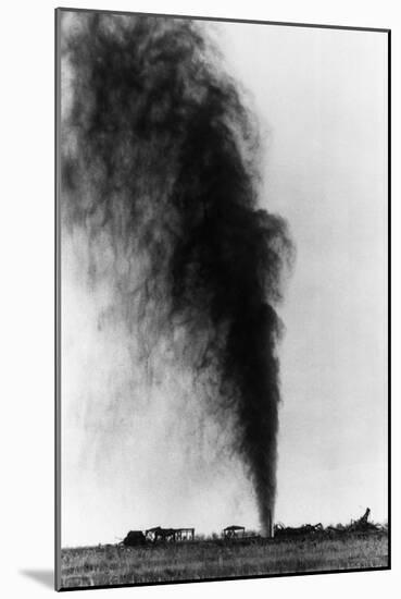 Gushing Oil Well after Gas Explosion Destroyed Derrick-null-Mounted Photographic Print