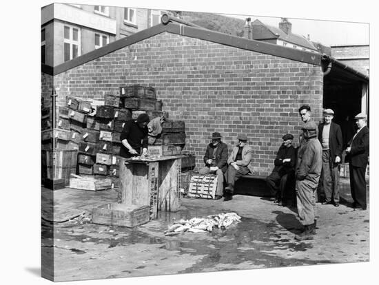 Gutting Fish Outside a Warehouse in Whitby, North Yorkshire, 1959-null-Stretched Canvas