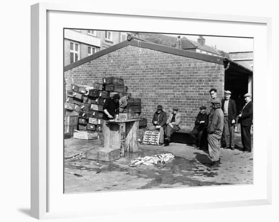 Gutting Fish Outside a Warehouse in Whitby, North Yorkshire, 1959-null-Framed Photographic Print