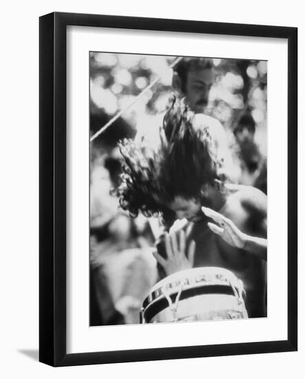 Guy Playing Drums at Woodstock Music Festival-null-Framed Photographic Print