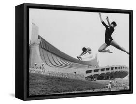 Gymnasts Outside the New Olympic Building in Japan-Larry Burrows-Framed Stretched Canvas