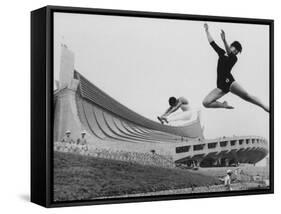 Gymnasts Outside the New Olympic Building in Japan-Larry Burrows-Framed Stretched Canvas