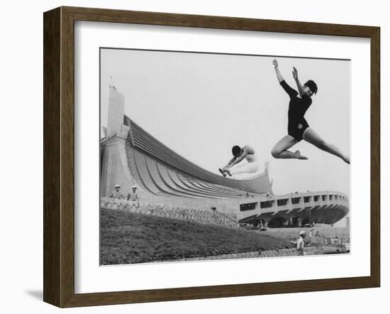 Gymnasts Outside the New Olympic Building in Japan-Larry Burrows-Framed Photographic Print