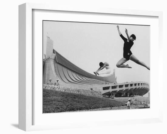 Gymnasts Outside the New Olympic Building in Japan-Larry Burrows-Framed Photographic Print