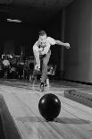 1960s MAN RELEASING BALL DOWN BOWLING ALLEY LANE-H. Armstrong Roberts-Photographic Print