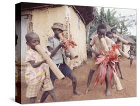 Haitian Children Playing Long Cylindrical Musical Instruments Made of Bamboo-Lynn Pelham-Stretched Canvas