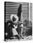 Haitian Native Engaged in a Siesta Next to Giant American Toothbrush Ad He Totes Around the Streets-Rex Hardy Jr.-Stretched Canvas