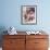 Haitian Woman Smoking a Pipe while Holding a Baby-Lynn Pelham-Framed Photographic Print displayed on a wall