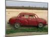 Half a Skoda on a Wall in a Car Salesyard Near Piestany, Slovakia, Europe-Strachan James-Mounted Photographic Print
