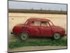 Half a Skoda on a Wall in a Car Salesyard Near Piestany, Slovakia, Europe-Strachan James-Mounted Photographic Print