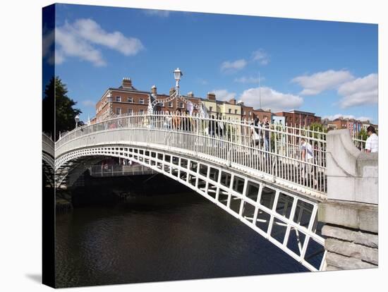 Halfpenny Bridge over River Liffey, Dublin, Republic of Ireland, Europe-Hans Peter Merten-Stretched Canvas