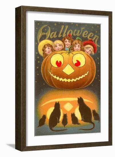 Halloween, Children behind Jack O'Lantern-null-Framed Art Print