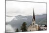 Hallstatt, Salzkammergut Region, Austria: Village By Lake On A Rainy Day With Low-Hanging Clouds-Axel Brunst-Mounted Photographic Print