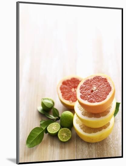 Halved Grapefruits and Limes-Louise Lister-Mounted Photographic Print