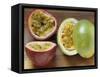 Halved Purple Granadilla and Granadilla (Passion Fruit)-Eising Studio - Food Photo and Video-Framed Stretched Canvas