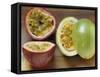 Halved Purple Granadilla and Granadilla (Passion Fruit)-Eising Studio - Food Photo and Video-Framed Stretched Canvas