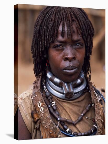 Hamar Woman in Village Square of Dimeka, Married Women Wear Two Heavy Steel Necklaces, Ethiopia-John Warburton-lee-Stretched Canvas