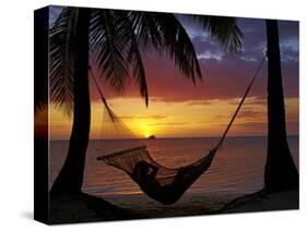 Hammock and Sunset, Plantation Island Resort, Malolo Lailai Island, Mamanuca Islands, Fiji-David Wall-Stretched Canvas