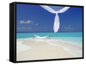Hammock Hanging in Shallow Clear Water, the Maldives, Indian Ocean, Asia-Sakis Papadopoulos-Framed Stretched Canvas