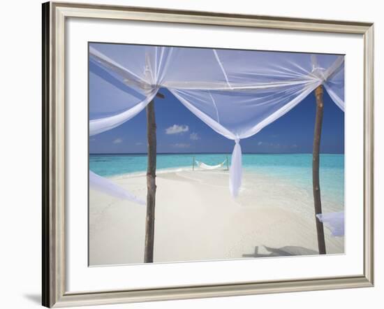 Hammock Hanging in Shallow Clear Water, the Maldives, Indian Ocean, Asia-Sakis Papadopoulos-Framed Photographic Print