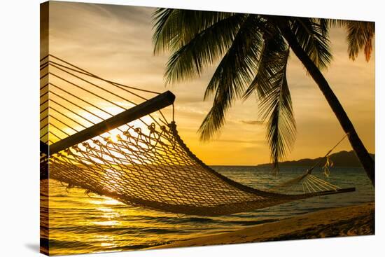 Hammock Silhouette with Palm Trees on a Beautiful Beach at Sunset-Martin Valigursky-Stretched Canvas