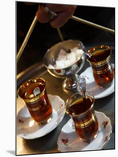 Hand Holding a Tray with Turkish Tea, Istanbul, Turkey, Europe-Levy Yadid-Mounted Photographic Print