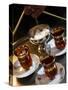 Hand Holding a Tray with Turkish Tea, Istanbul, Turkey, Europe-Levy Yadid-Stretched Canvas