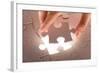 Hand Holding Puzzle Piece-maksheb-Framed Art Print