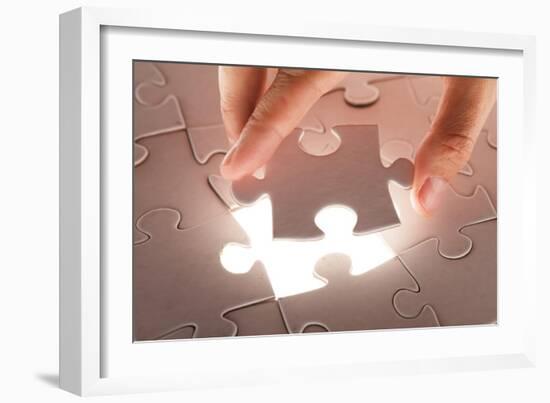 Hand Holding Puzzle Piece-maksheb-Framed Art Print