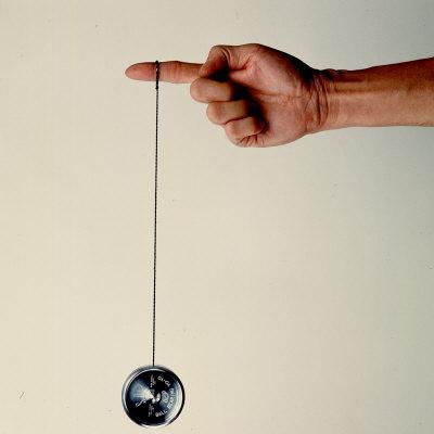 Hand Holding String Attached to Tom Khun Yo-Yos Ltd's High-Tech, Aluminum,  Ball Bearing Yo-Yo' Photographic Print - Ted Thai | AllPosters.com