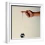 Hand Holding String Attached to Tom Khun Yo-Yos Ltd's High-Tech, Aluminum, Ball Bearing Yo-Yo-Ted Thai-Framed Photographic Print