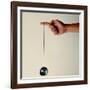 Hand Holding String Attached to Tom Khun Yo-Yos Ltd's High-Tech, Aluminum, Ball Bearing Yo-Yo-Ted Thai-Framed Photographic Print