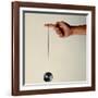 Hand Holding String Attached to Tom Khun Yo-Yos Ltd's High-Tech, Aluminum, Ball Bearing Yo-Yo-Ted Thai-Framed Photographic Print