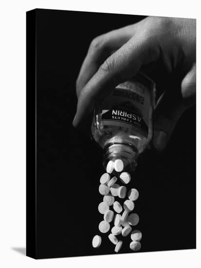 Hand Pouring Aspirin from Bottle-Philip Gendreau-Stretched Canvas