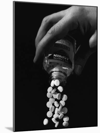 Hand Pouring Aspirin from Bottle-Philip Gendreau-Mounted Photographic Print