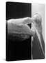 Hand Pressing a Door Bell-Philip Gendreau-Stretched Canvas