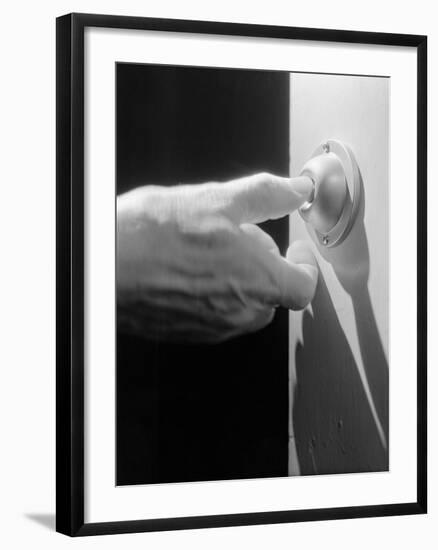 Hand Pressing a Door Bell-Philip Gendreau-Framed Photographic Print