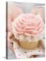 Hands Holding Cupcake with Marzipan Rose-null-Stretched Canvas