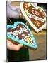 Hands Holding Lebkuchen Hearts (Oktoberfest, Munich)-null-Mounted Photographic Print