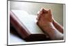 Hands Praying on a Holy Bible-null-Mounted Premium Giclee Print