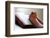 Hands Praying on a Holy Bible-null-Framed Art Print