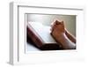 Hands Praying on a Holy Bible-null-Framed Art Print