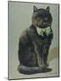 Handsome Black Cat Sir Thomas Mouser Sits Posed with a Green Ribbon Around His Neck-null-Mounted Photographic Print
