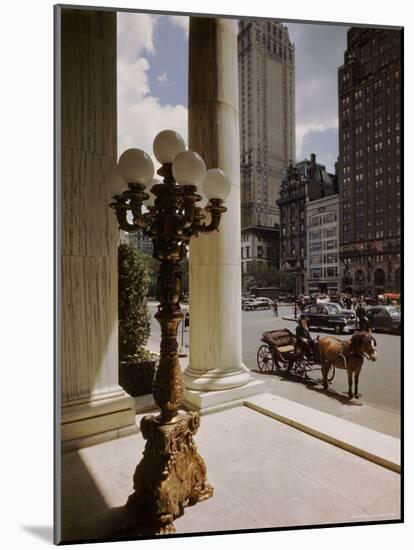 Handsome Cab Horse Drawn Carriage Waiting Outside Entrance of the Plaza Hotel-Dmitri Kessel-Mounted Photographic Print