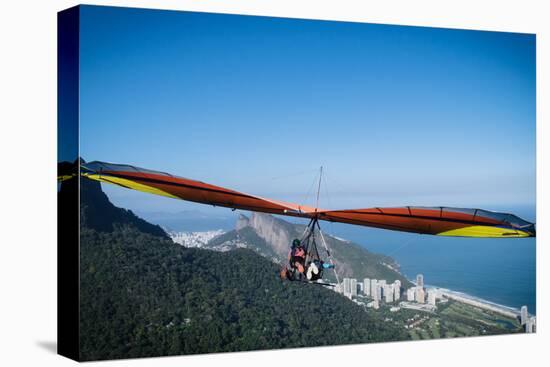 Hang gliding in Rio de Janeiro, Brazil, South America-Alexandre Rotenberg-Stretched Canvas