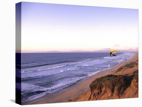 Hang Gliding off Beach in Monterey, California, USA-Georgienne Bradley-Stretched Canvas