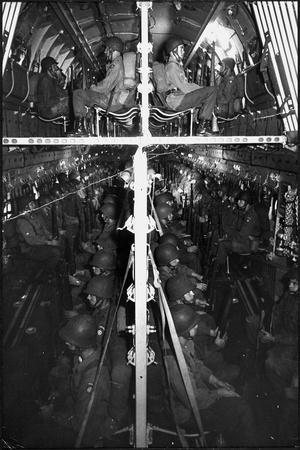 Two Hundred Paratroopers Sitting in Double Decker During Training Maneuvers