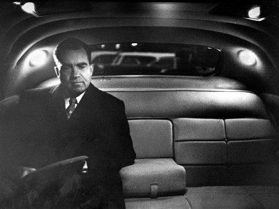 VP Richard Nixon Sitting Solemnly in Back Seat of Dimly Lit Limousine