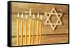 Hanukkah Candle on Wooden Background-Yastremska-Framed Stretched Canvas