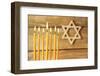 Hanukkah Candle on Wooden Background-Yastremska-Framed Photographic Print